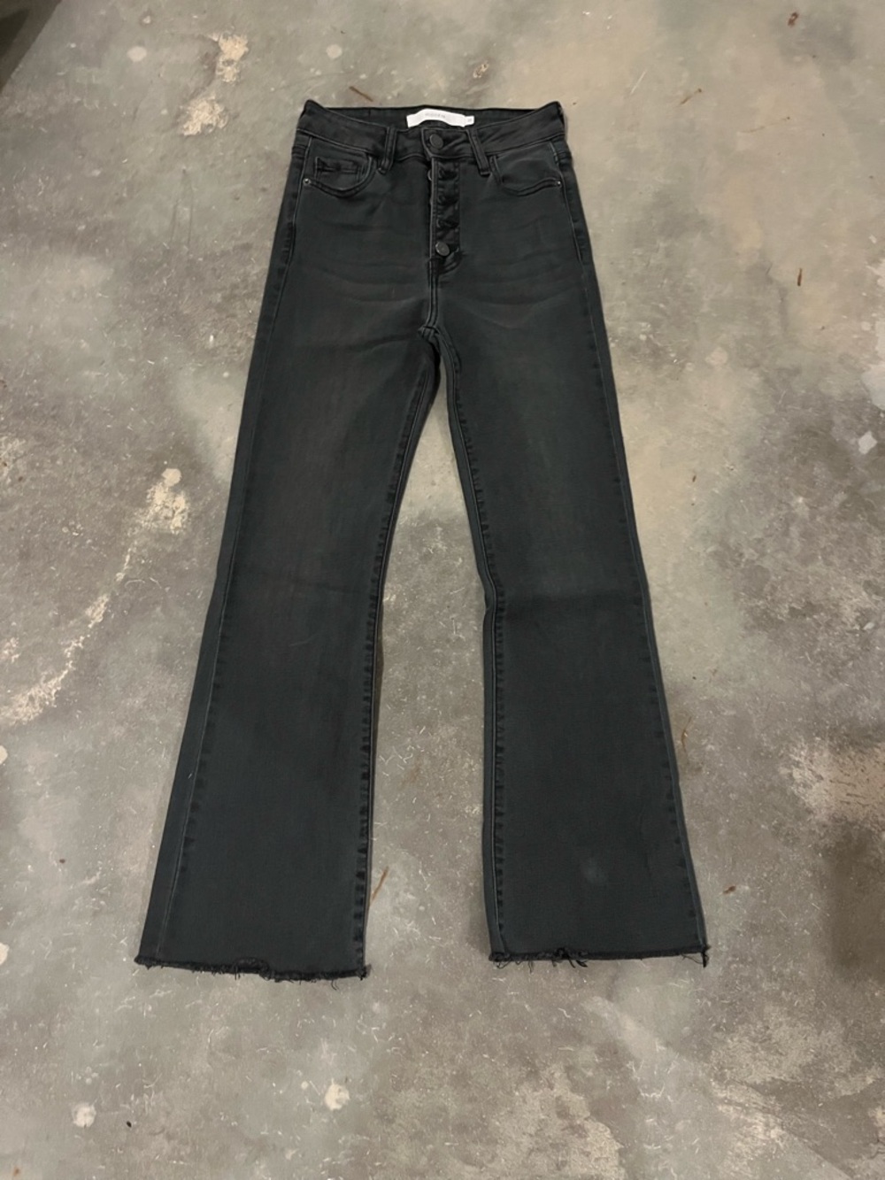 Hidden High-Rise Distressed Black Flare Jeans with Button-Fly